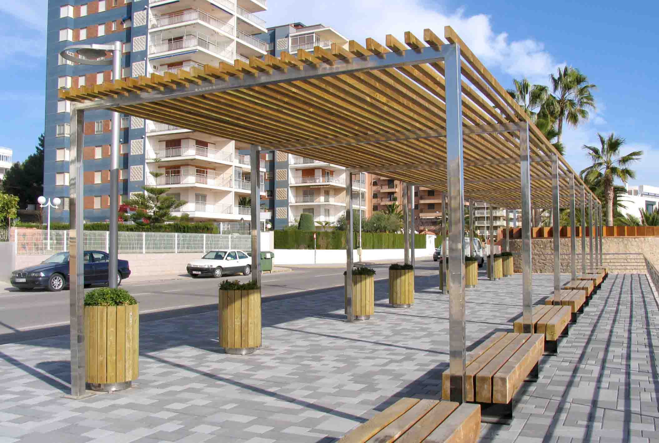 Pergola of wood and steel at a seafront